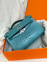 Hermès Kelly Pochette: Bleu Paon Shiny Mississippiensis Alligator