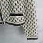 Chanel 26 Spring/Summer Knit Cardigan – Black and White Geometric Jacquard, V-Neck, Wool Blend