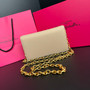 Schiaparelli Double-Eye Clutch Gold
