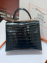 Hermès Kelly 28 Dark Green High-Gloss Nile Crocodile Gold Hardware