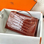 Hermès Kelly Pochette Shiny Porosus Crocodile / Alligator Lisse (Miel PHW)