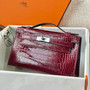 Hermès Kelly Pochette Shiny Porosus Crocodile / Alligator Lisse (Rouge H / Bordeaux PHW)