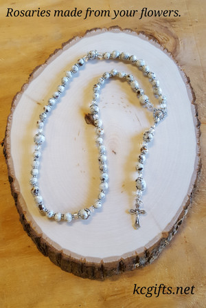 Rosary beads made with memorial flowers.