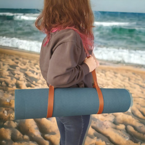 Hand crafted leather yoga mat or picnic blanket sling.