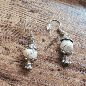 Ear rings made from your memorial flowers. Ear rings made from your memorial flowers.