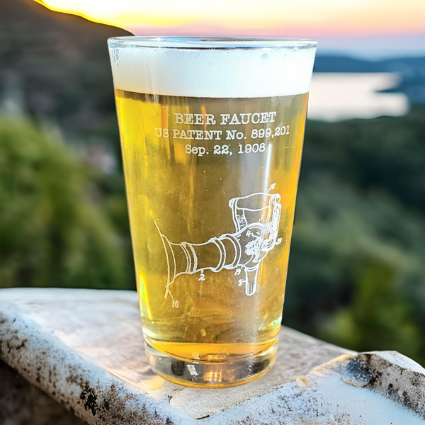 Engraved beer pint glass with the United States Patent for a beer related invention.