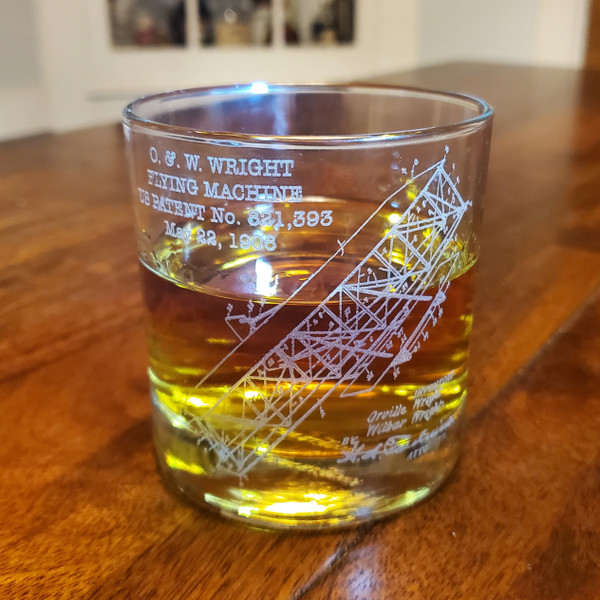 Engraved whiskey glass with vintage aviation patent.