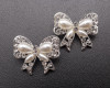 1 1/4"x 1" Silver Bow Brooch with Clear Rhinestones and White Pearl - Pack of 12