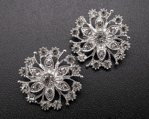 1 1/4" Silver Round Flower Brooch with Clear Rhinestones - Pack of 12 1 1/4" Silver Round Flower Brooch with Clear Rhinestones - Pack of 12