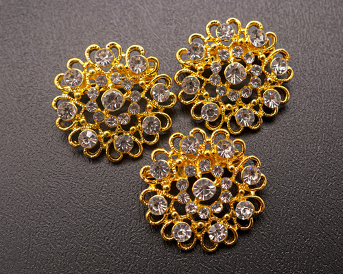 1 1/4" Yellow Gold Round Floral Brooch with Clear Rhinestones - Pack of 12 1 1/4" Yellow Gold Round Floral Brooch with Clear Rhinestones - Pack of 12