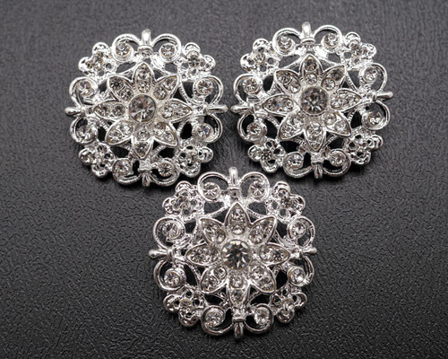 1 1/4" Silver Round Brooch with Clear Rhinestones - Pack of 12 1 1/4" Silver Round Brooch with Clear Rhinestones - Pack of 12