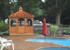 Screened pool gazebo made of red cedar wood with solid knee wall Screened pool gazebo made of red cedar wood with solid knee wall