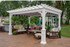 10x14 Serenity Vinyl Pergola Kit with Shade Master Retractable Canopy, featuring Sunbrella™ Brand premium fabric.
