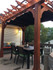 6x10 Classic Cedar Pergola Kit, Cedar color stain, Black Sunbrella™ Retractable Canopy, Framingham, MA