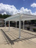 12x28 Classic White Vinyl Pergola Kit - poolside at an apartment complex