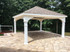 16x16 pressure treated pine pavilion wrapped in vinyl trim board