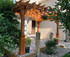 Shady Patio Under Arched Cedar Pergola, Thornton, CO