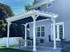 8 x 16 Classic Vinyl Pergola with 10 foot tall posts and Charcoal Premium Canopy in Westhampton Beach, NY 8 x 16 Classic Vinyl Pergola with 10 foot tall posts and Charcoal Premium Canopy in Westhampton Beach, NY