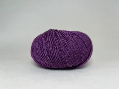 A ball of Sirdar Cashmere Merino Silk DK in color Violet A ball of Sirdar Cashmere Merino Silk DK in color Violet