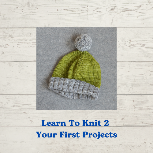 Learn to Knit Level 2 class, Your First Projects -- picture shows a knitted hat with a pom pom