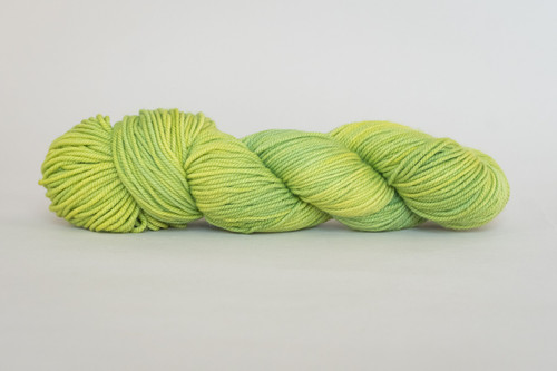 Skein of Hudson Highlands DK yarn, color: Lemon Lime