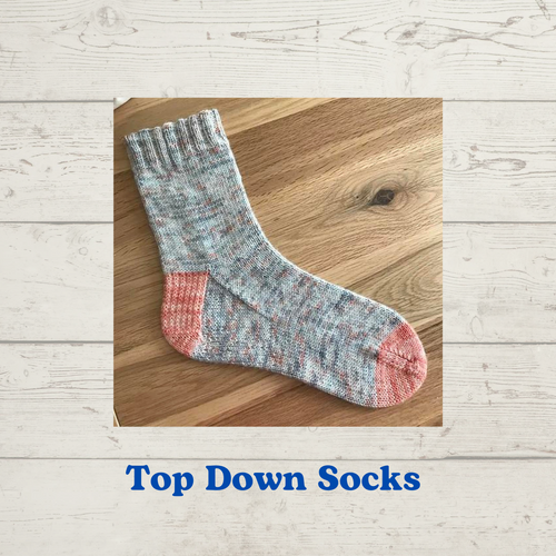 Top Down Socks class -- picture shows a knitted sock with contrasting toe and heel