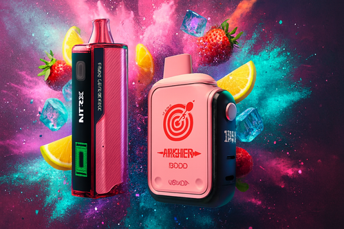 The photo shows two colorful vape devices set against a dynamic, vibrant background filled with splashes of bright pink, blue, and teal. The device on the left is labeled “NTRX” and features a pink and black design with a green digital display, while the device on the right is marked “ARKHER BODD” with a red target logo on its pink and black body. Floating around them are strawberries, orange slices, and ice cubes, reinforcing a fruity and refreshing theme. The lively composition highlights both the bold design and flavor appeal of the products.