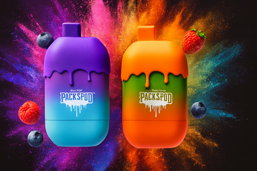 The photo shows two brightly colored PACKSPOD vape devices set against a dynamic, paint-splattered background. The left device, labeled “Blow POP,” fades from purple to blue with a dripping paint design, while the right, “Berry Blasted Mango,” shifts from orange to green in the same style. Surrounding them are fresh berries—blueberries, raspberries, and strawberries—highlighting the fruity flavors, and the overall composition bursts with energy and bold color, giving it a strong promotional appeal.