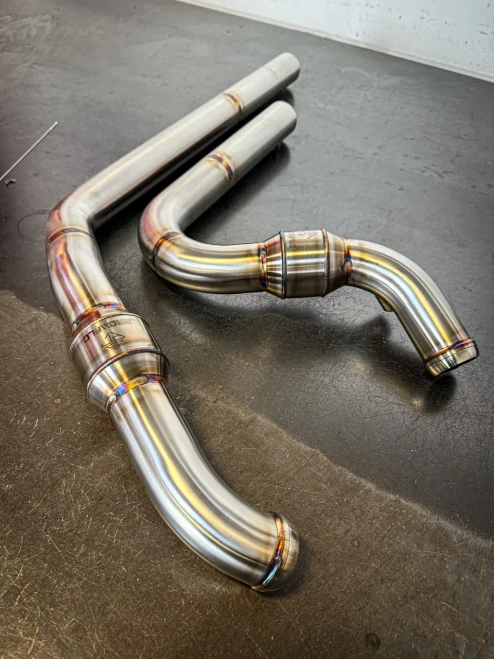 Photo shows stainless; supplied finish is Black. Manufacturer Pro Flo design reference. Actual header routing varies by the selected motorcycle and matching SPC system. Headers only; muffler not included.