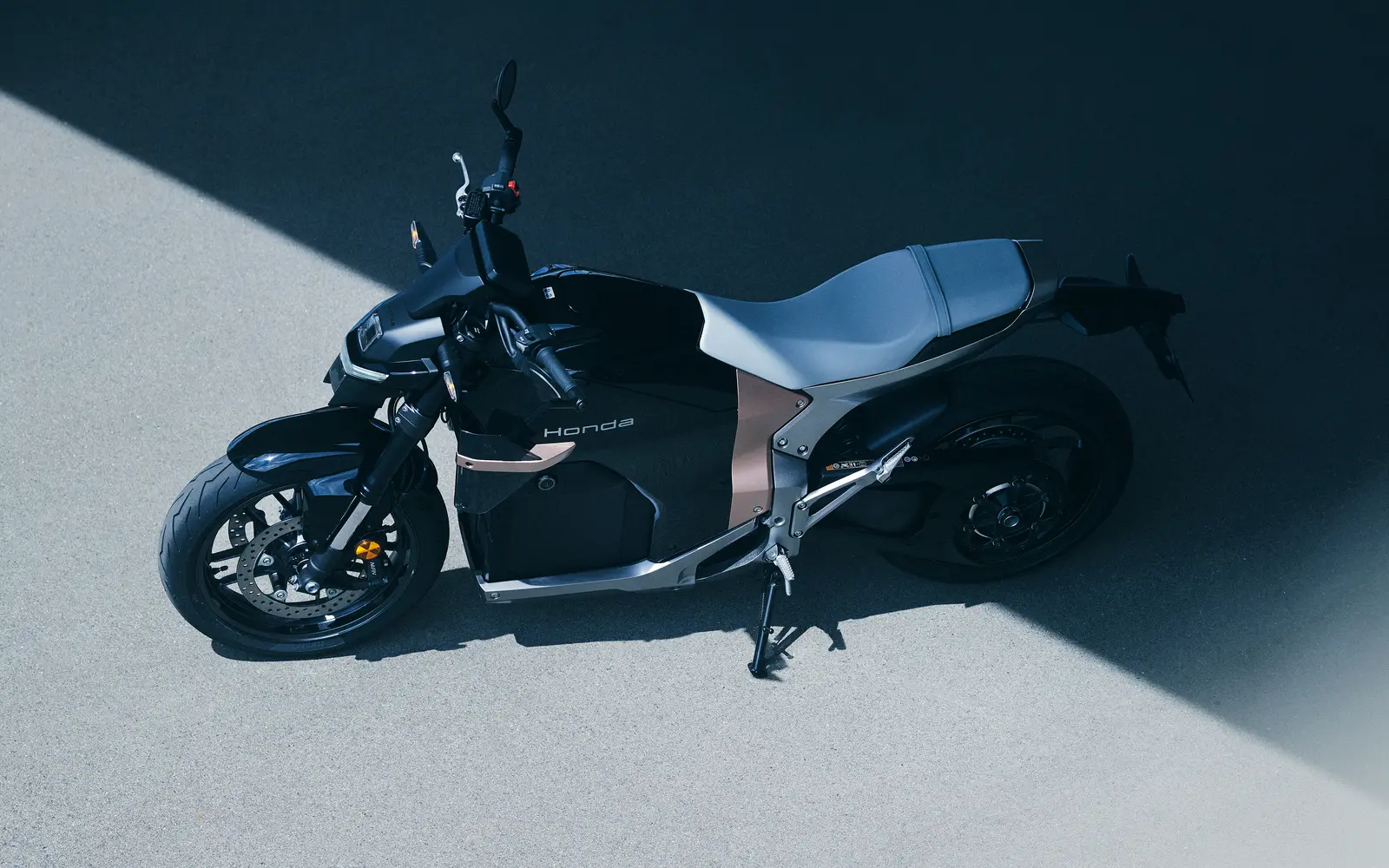 Honda WN7 electric street motorcycle photographed from above