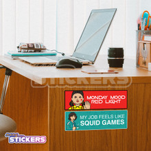 Red and Turquoise squid game inspired bumper sticker on office desk and laptop.