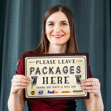 Please Leave Package here women holding vinyl sign