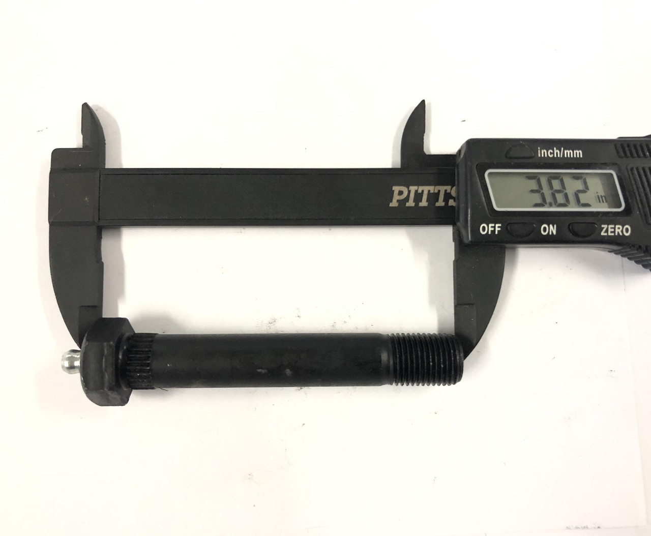 9/16"-18 x 3-1/2" steel shackle bolt with zerk fitting.