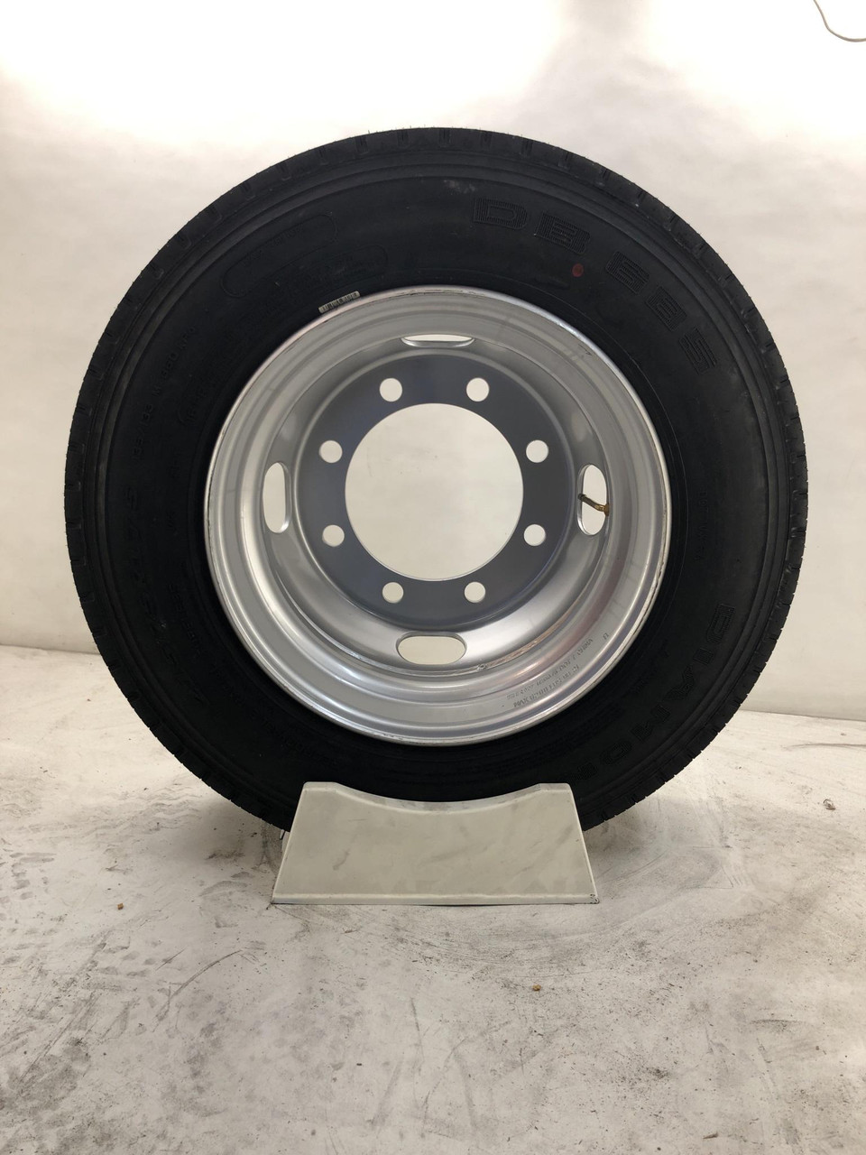 215/75R17.5 16-Ply DiamondBack All Steel Tire on Silver Dual 8x275