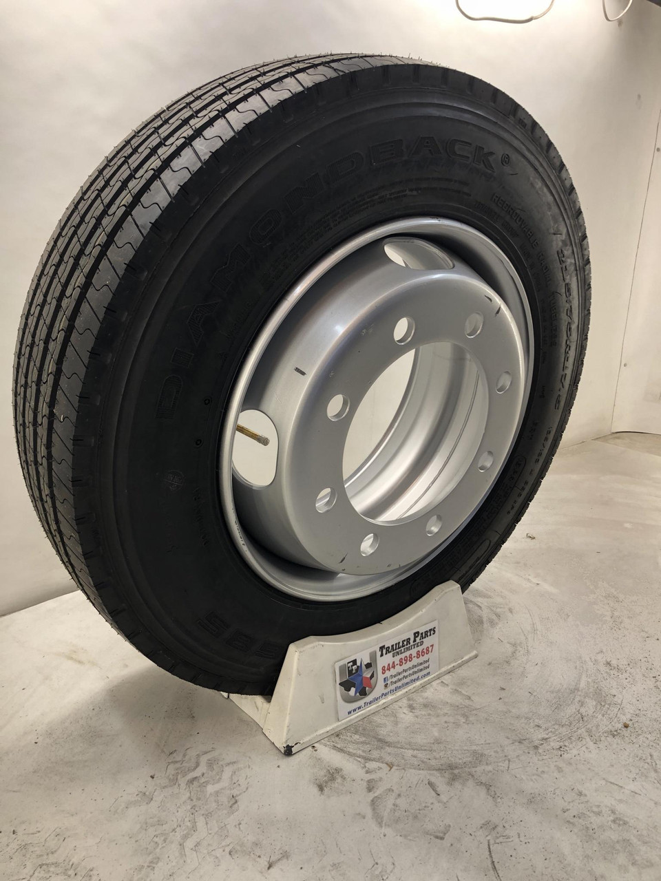 215/75R17.5 16-Ply DiamondBack All Steel Tire on Silver Dual 8x275