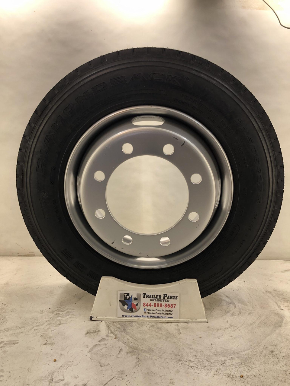 215/75R17.5 16-Ply DiamondBack All Steel Tire on Silver Dual 8x275