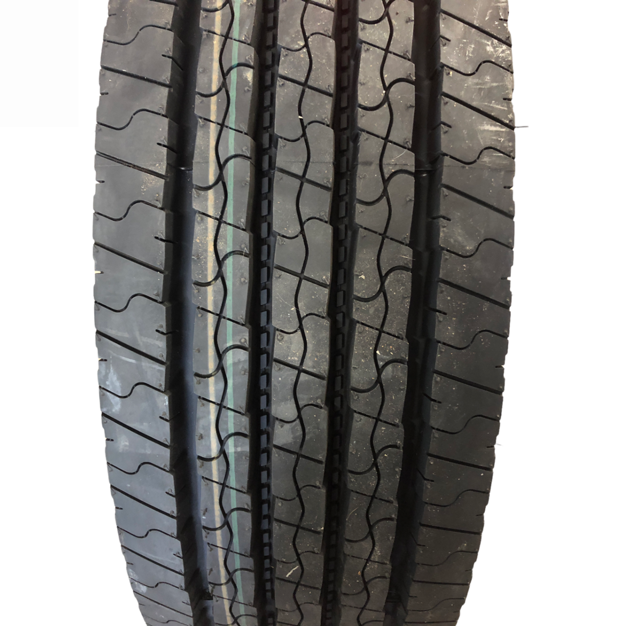 235/75R17.5 18-Ply Taskmaster All Steel Tire on Solid Silver