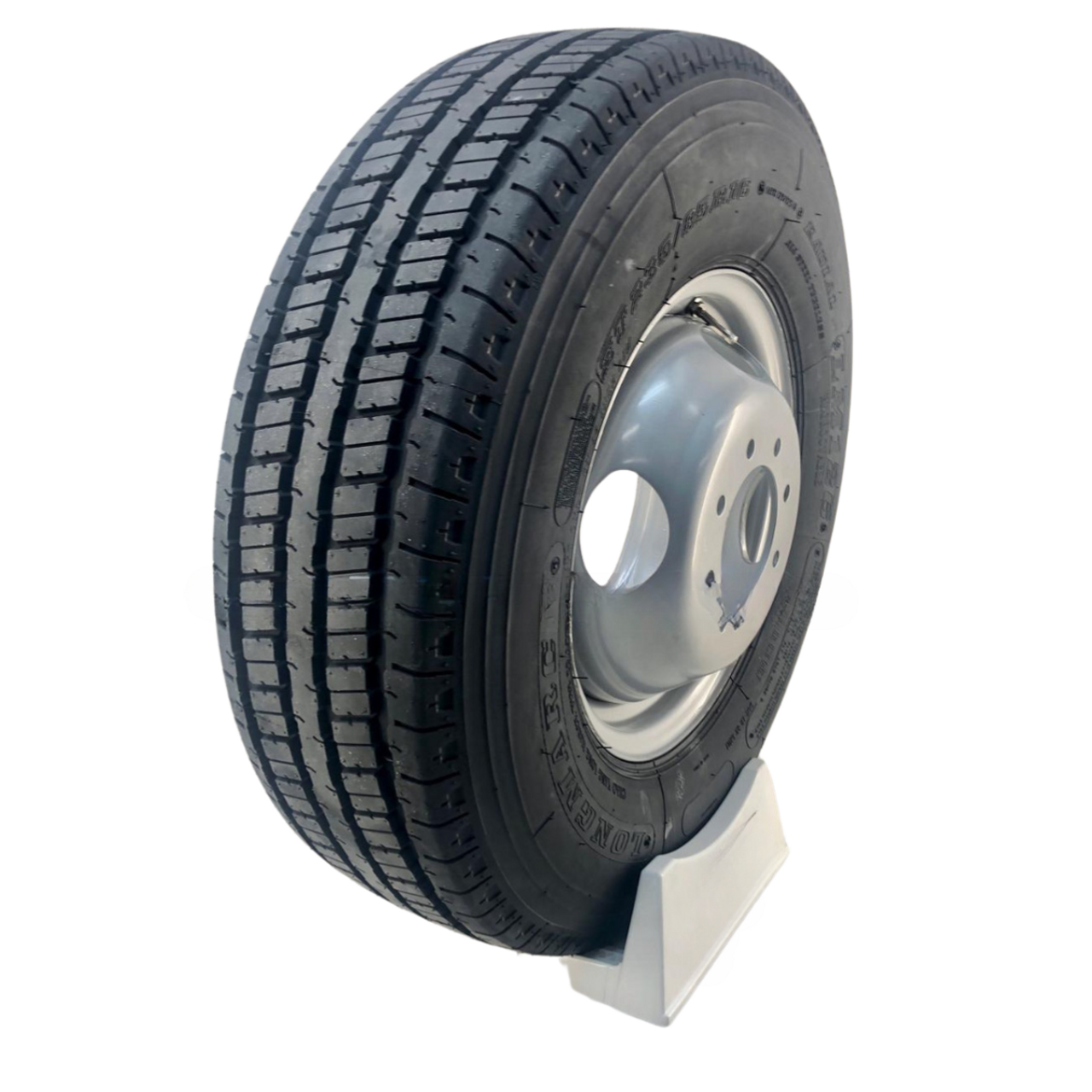 ST235/85R16 14-Ply Long March All Steel Tire on Silver Hub Piloted Dual Wheel 8x6.5" ST235/85R16 14-Ply Long March All Steel Tire on Silver Hub Piloted Dual Wheel 8x6.5"