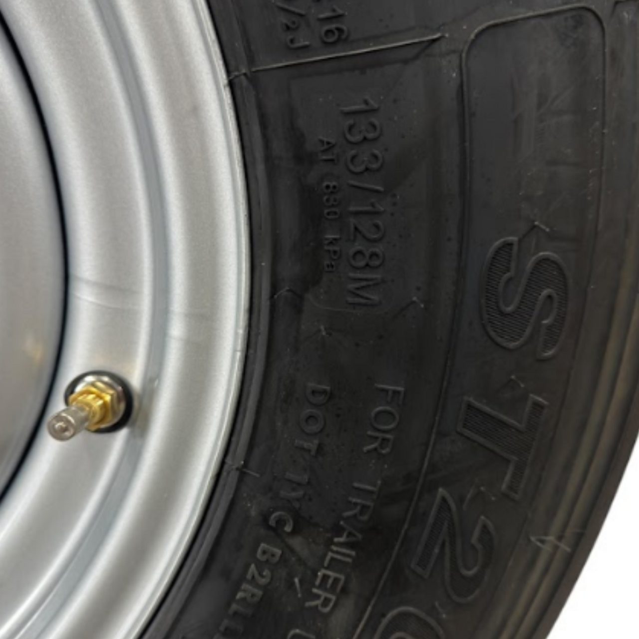 ST235/85R16 16-Ply Trailer Tire on Silver Mod Wheel | 8 Lug | Load Range H