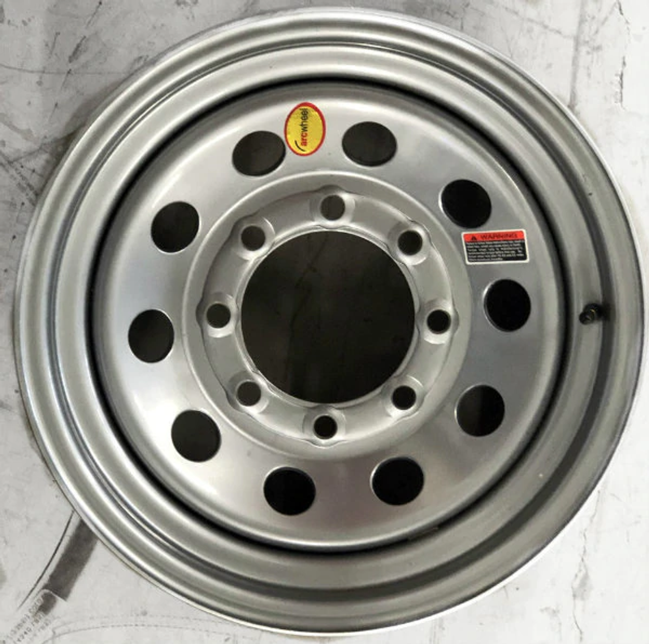 16" Trailer Wheel. Silver mod 8 lug on 6.5" bolt pattern. 