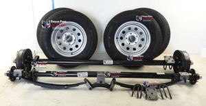 2 axle trailer build kit. 2 axles one with brakes and 15" tires and wheels to build your own trailer