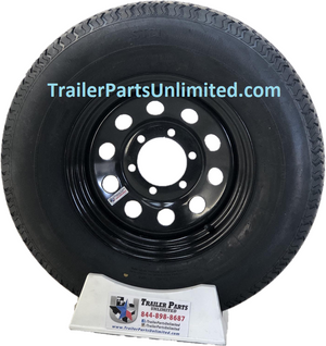 15" 10 ply lre trailer tire mounted on black rim 6 lug
