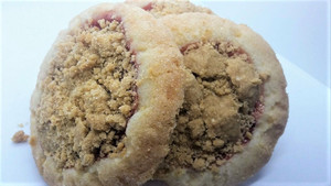 A soft and chewy sugar cookie stuffed with pie fillings and baked with a crunchy streusel topping.