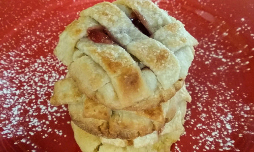 organic cherries and vanilla baked into a soft sugar cookie topped with butter lattice pie crust and sprinkled with raw sugar.