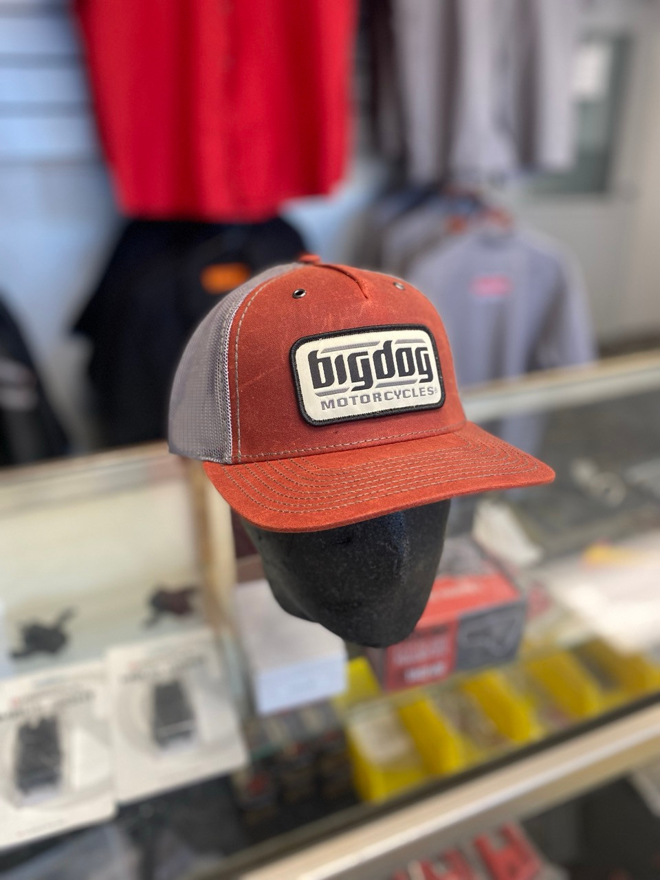 Burnt red color snapback cap with black lettering Big Dog