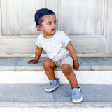 Baby boy wearing Robeez Blue Sebastian Shark Soft Soles