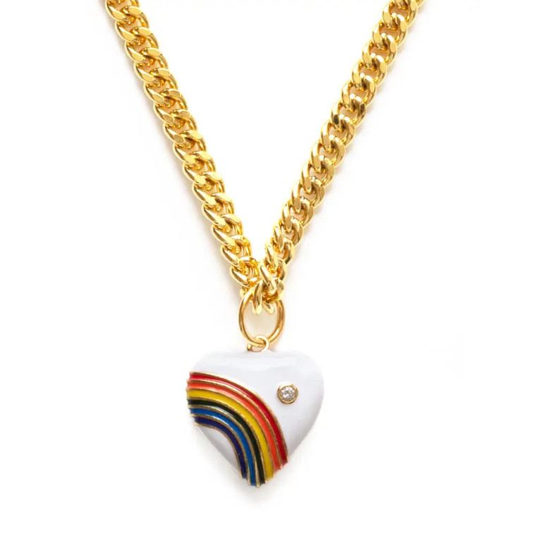 80's Rainbow Heart Necklace
We scored a small batch of these 80's vintage inspired rainbow heart pendants. We put them on the Cuban chain and boom! Just put on your roller skates and you are good to go! Chain is 18" long and is made of 14k gold plated brass. The pendant is double sided and measures 3/4".