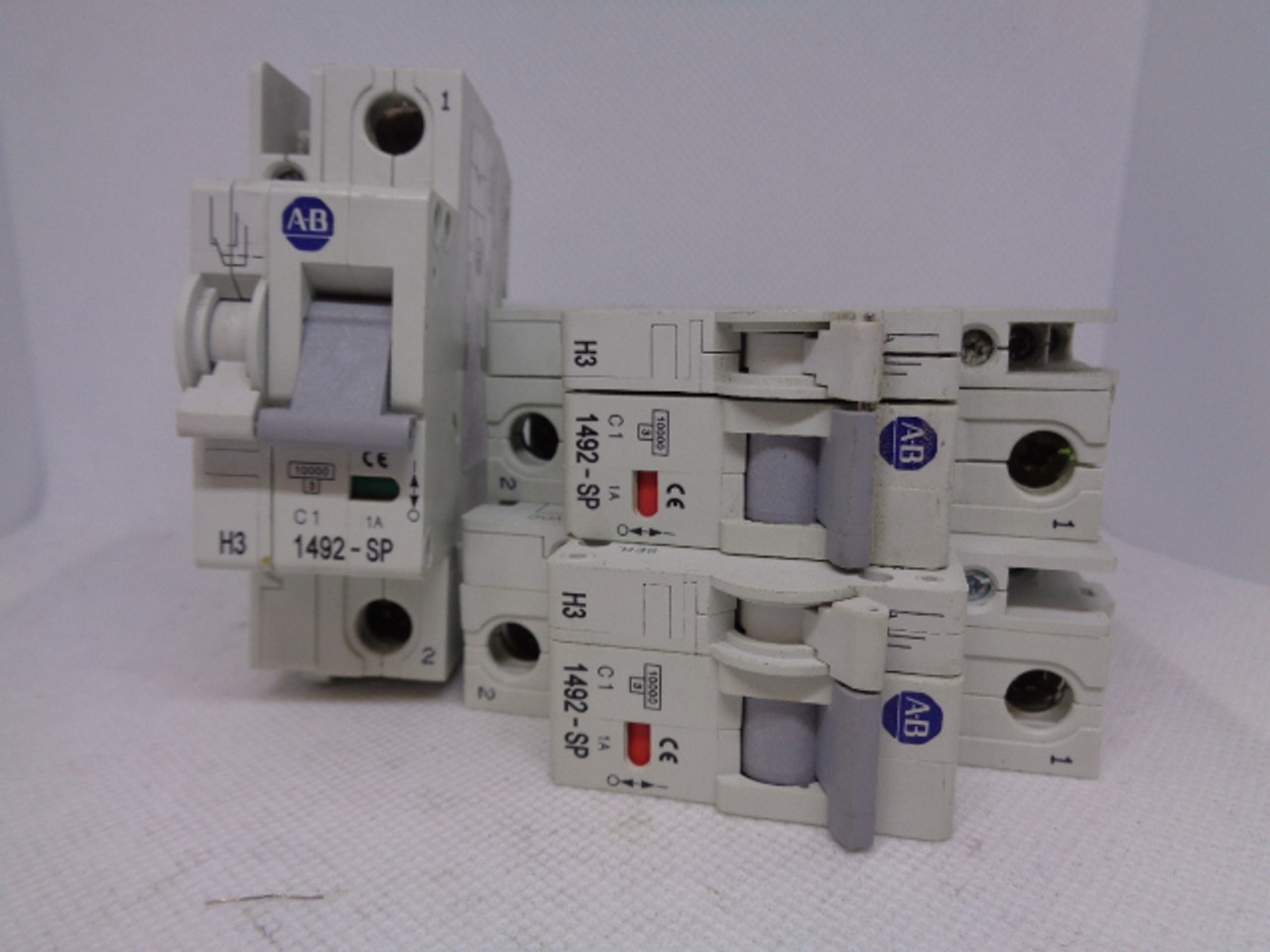 (3) Allen Bradley 1492-SP1C100 Ser. C, C1, 1A Circuit Breakers w/ 1492-ASPH3