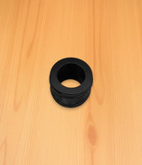 Back plug for a replacement barrel shroud tube, featuring a textured grip surface for secure installation and removal in barrel shroud systems.

Back plug for replacement barrel shroud tube.