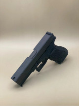 Side profile of the Kineti-Tech OEM Style Beveled Slide for Glock® 17 Gen 3 in Armor Black CERAKOTE® finish. Highlights include OEM-style simplicity, beveled edges, and corrosion-resistant finish for durability.

Side view Armor Black Kineti-Tech OEM Style Beveled Slide for Glock 17 Gen 3.